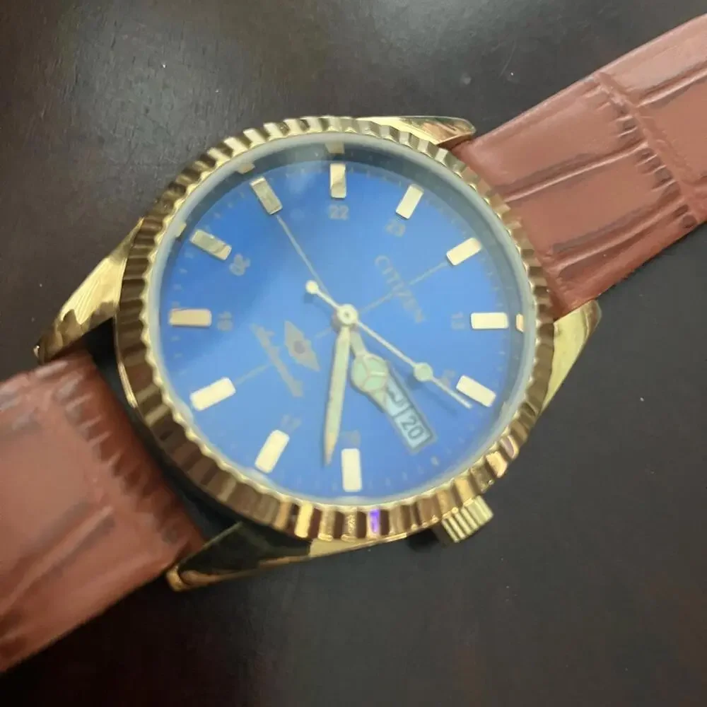 Citizen Gold Watch with Blue Dial and Tan Strap